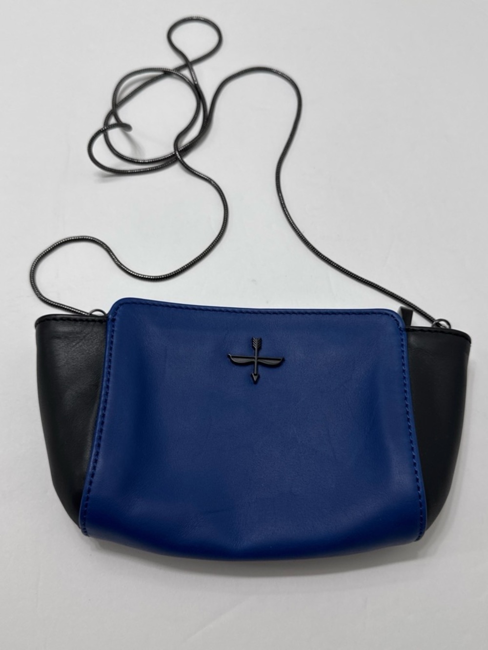 Pour La Victoire Blue and Black Leather Crossbody with Metal Logo Accent